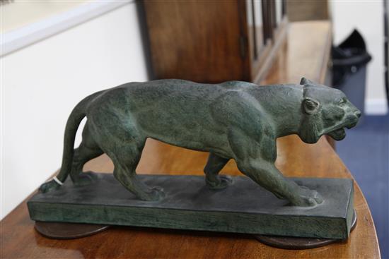 A French Art Deco painted terracotta figure of a panther, 24in.